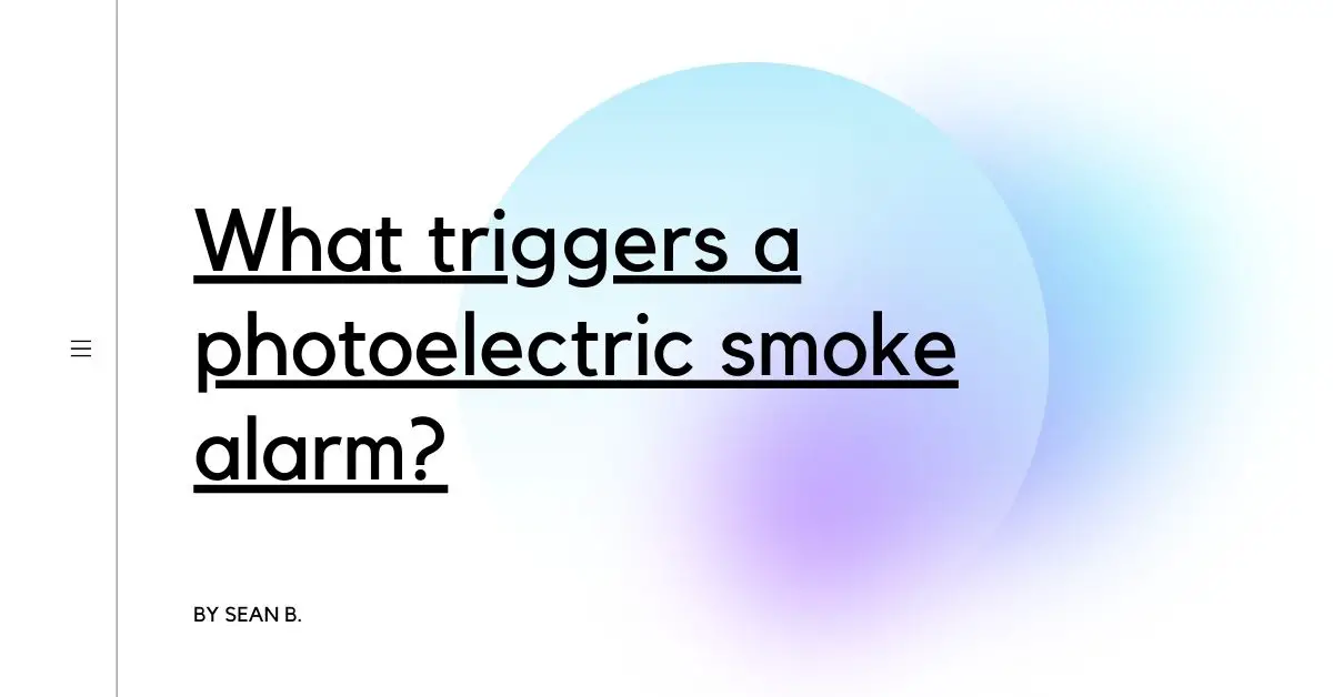 What triggers a photoelectric smoke alarm?